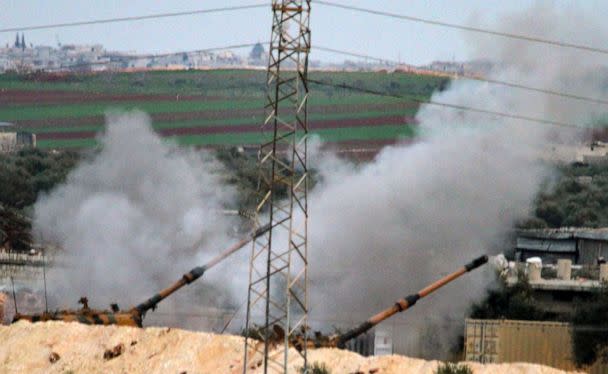 PHOTO: Turkish 155mm self-propelled artillery guns positioned east of the rebel-held city of Binnish, fire toward Syrian regime-controlled positions near Saraqib, Idlib, Syria, March 5, 2020. (Abdulwajed Haj Esteifi/AFP via Getty Images)