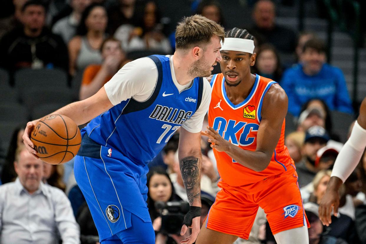 Dec 2, 2023; Dallas, Texas, USA; Dallas Mavericks guard Luka Doncic (77) and Oklahoma City Thunder guard Shai Gilgeous-Alexander (2) in action during the game between the Dallas Mavericks and the Oklahoma City Thunder at the American Airlines Center. Mandatory Credit: Jerome Miron-USA TODAY Sports