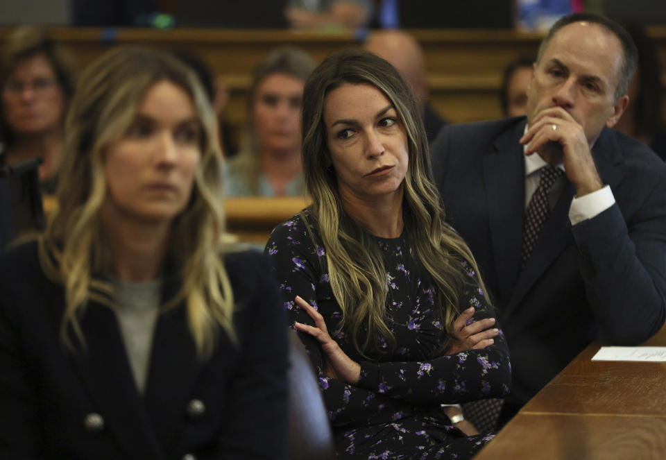 Karen Read listens during closing arguments in her trial at Norfolk Superior Court on Tuesday, June 25, 2024 in Dedham, Mass. Read is accused of killing her boyfriend Boston police Officer John O'Keefe, in 2022. (Nancy Lane/The Boston Herald via AP, Pool)