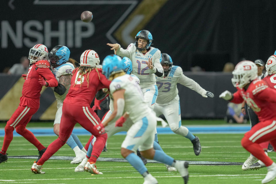 May 13, 2023; San Antonio, TX, USA; Arlington Renegades quarterback <a class="link " href="https://sports.yahoo.com/nfl/players/31734/" data-i13n="sec:content-canvas;subsec:anchor_text;elm:context_link" data-ylk="slk:Luis Perez;sec:content-canvas;subsec:anchor_text;elm:context_link;itc:0">Luis Perez</a> (12) throws a pass in the second half against the DC Defenders at the Alamodome. Mandatory Credit: Daniel Dunn-USA TODAY Sports