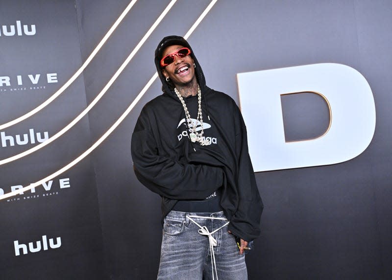 LOS ANGELES, CALIFORNIA - NOVEMBER 09: Wiz Khalifa attends the Los Angeles Premiere Event for Onyx’s Collective’s “Drive With Swizz Beatz” at Petersen Automotive Museum on November 09, 2023 in Los Angeles, California. 