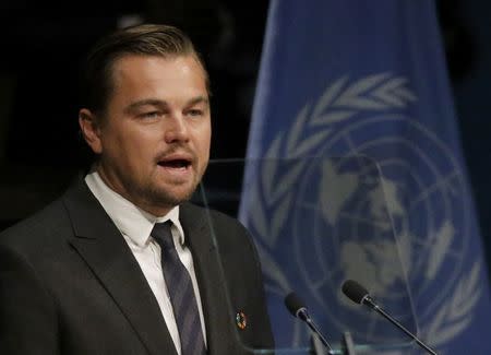 Actor Leonardo DiCaprio delivers his remarks during the Paris Agreement on climate change held at the United Nations Headquarters in Manhattan, New York, U.S., April 22, 2016. REUTERS/Carlo Allegri