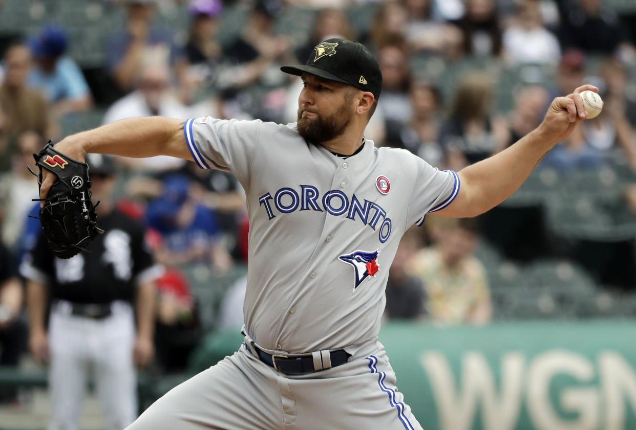Toronto Blue Jays starting pitcher Ryan Feierabend throws against the Chicago White Sox during the first inning of a baseball game in Chicago, Saturday, May 18, 2019. (AP Photo/Nam Y. Huh)