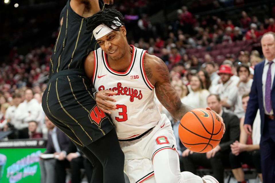 Feb 2, 2023; Columbus, OH, USA;  Ohio State Buckeyes guard Eugene Brown III (3) drives to the basket during the first half of the NCAA men’s basketball game against the Wisconsin Badgers at Value City Arena. Mandatory Credit: Adam Cairns-The Columbus Dispatch