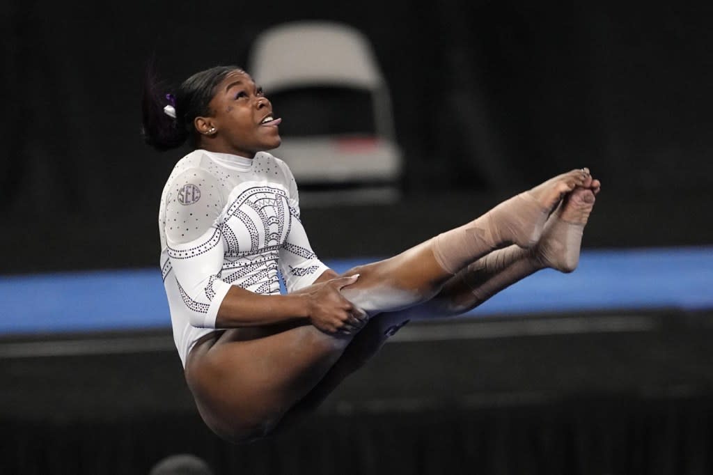 LSU’s Kiya Johnson competes in the floor exercise during the NCAA women’s gymnastics championships in Fort Worth, Texas, Saturday, April 20, 2024. (AP Photo/Tony Gutierrez)