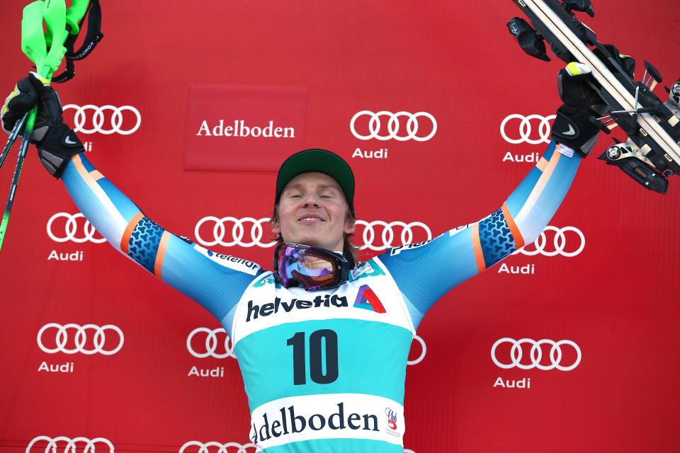 Norway's Henrik Kristoffersen celebrates his third place in an alpine ski World Cup men's slalom, looks up from on the podium in Adelboden, Switzerland, Sunday, Jan. 12, 2014. (AP Photo/Giovanni Auletta)