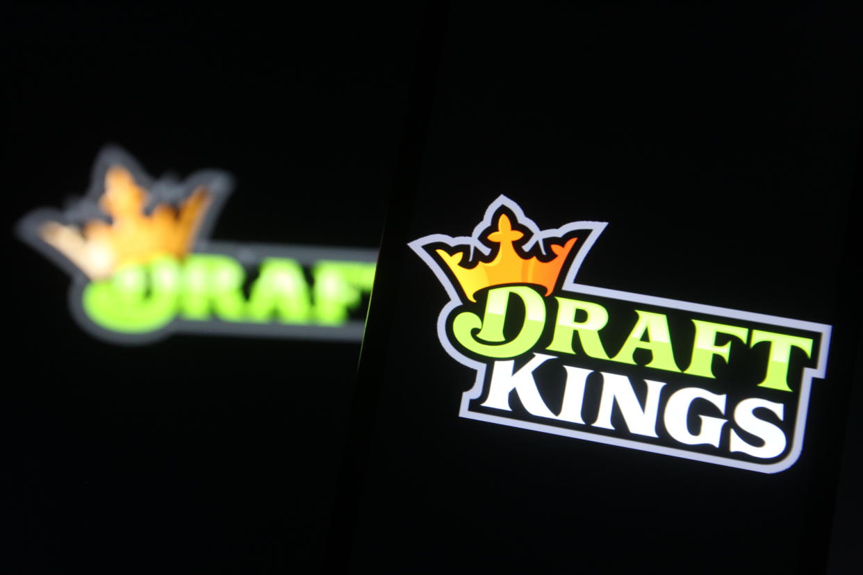 In this photo illustration a DraftKings logo, of the U.S. daily fantasy sports contest and sports betting operator, is seen on a mobile phone screen. (Photo by Pavlo Gonchar / SOPA Images/Sipa USA)
