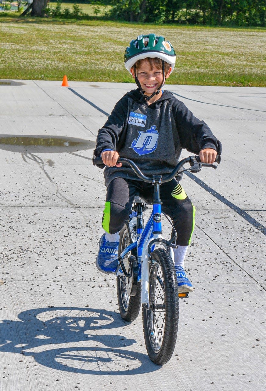 Eight-year-old William Veliz of Marblehead takes a ride on the maneuverability course  during Bike Safety Day at Hopfinger Zimmerman Memorial Park.