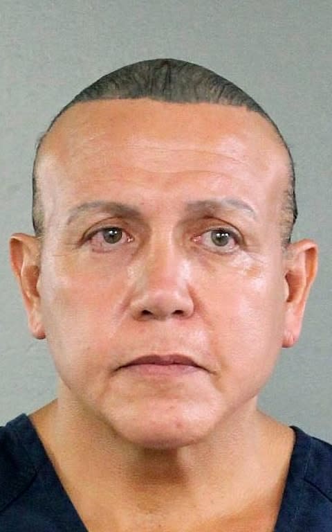 In this undated photo released by the Broward County Sheriff's office, Cesar Sayoc is seen in a booking photo