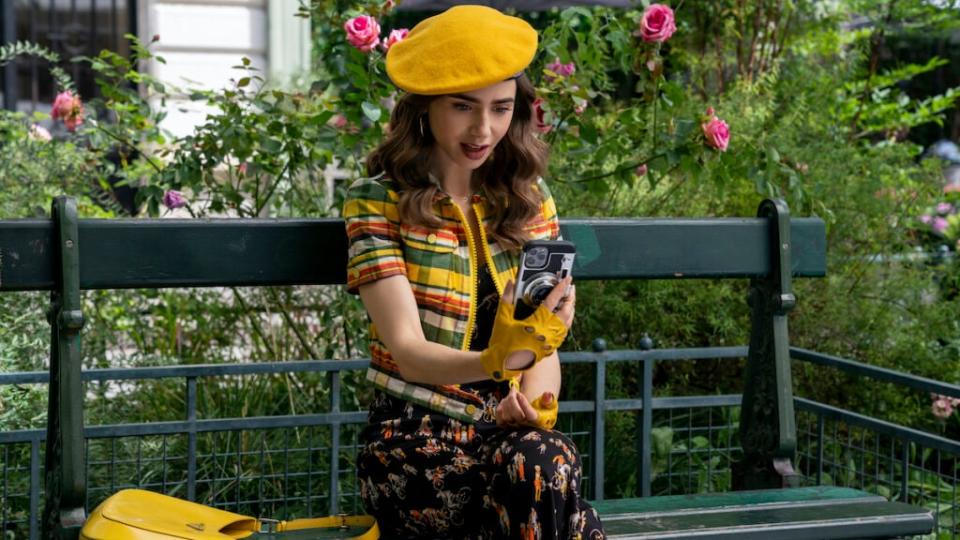 Emily in Paris. Lily Collins as Emily in episode 209 of Emily in Paris. Cr. Stéphanie Branchu/Netflix © 2021