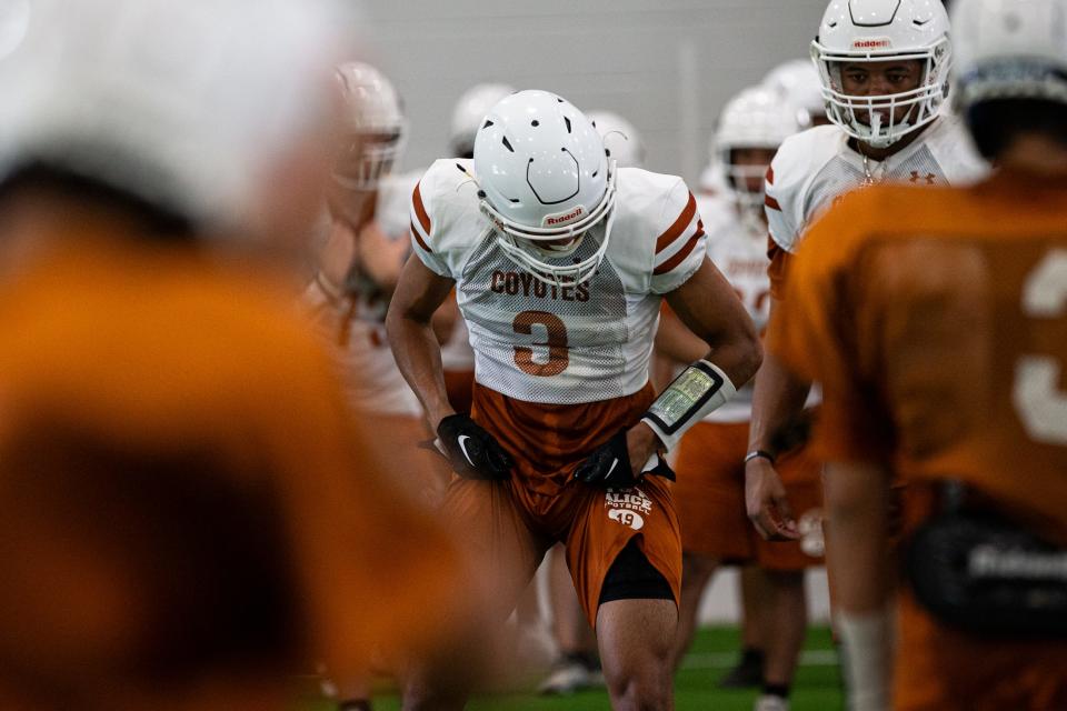 Alice wide receiver Justin Arellano prepares for a play during practice at the high school on Aug. 2, 2023, in Alice, Texas.