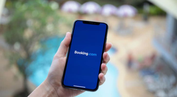 a person opens up Booking.com on a smartphone