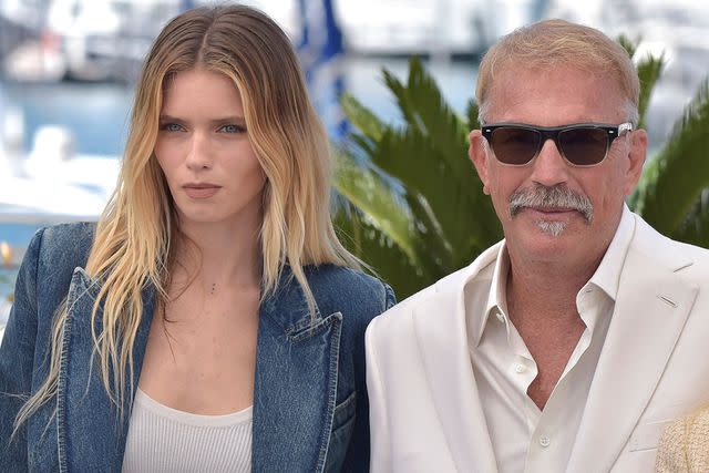 <p>Rocco Spaziani/getty</p> Abbey Lee and Kevin Costner at a photo call for <em>Horizon: An American Saga</em> in Cannes, France, on May 19, 2024