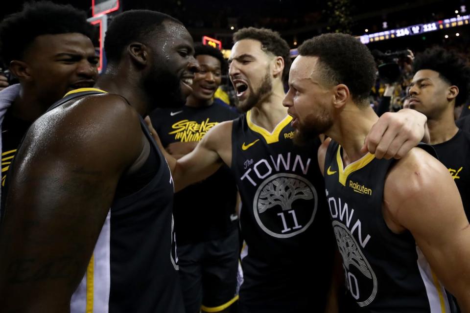 <div class="inline-image__caption"><p>Stephen Curry #30, Klay Thompson #11 and Draymond Green #23 of the Golden State Warriors celebrate after defeating the Portland Trail Blazers 114-111 in game two of the NBA Western Conference Finals at ORACLE Arena on May 16, 2019, in Oakland, California.</p></div> <div class="inline-image__credit">Ezra Shaw/Getty</div>