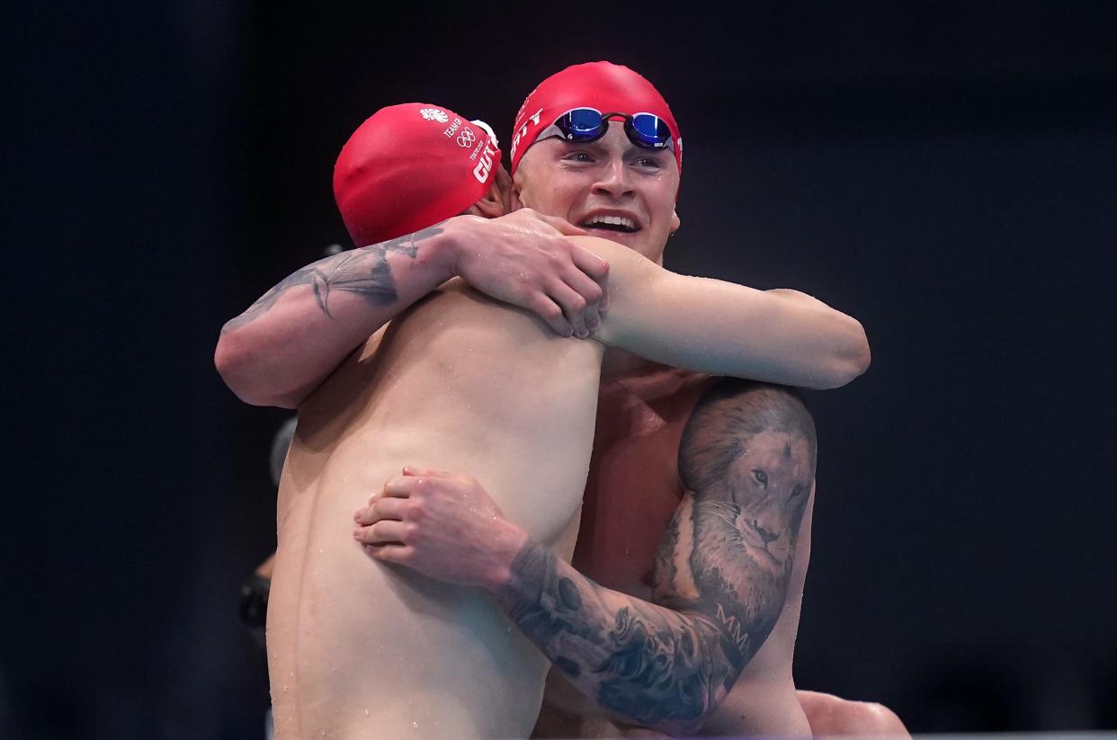 Adam Peaty and James Guy celebrate winning gold (Adam Davy/PA) (PA Wire)