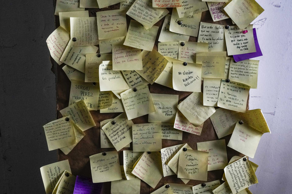 Notes placed by visitors are seen in the attic of the former secret detention and torture center Ex-Clinica Santa Lucia that was used during Augusto Pinochet´s dictatorship, ahead of 50th anniversary of the coup in Santiago, Chile, Monday, Aug. 28, 2023. (AP Photo/Esteban Felix)