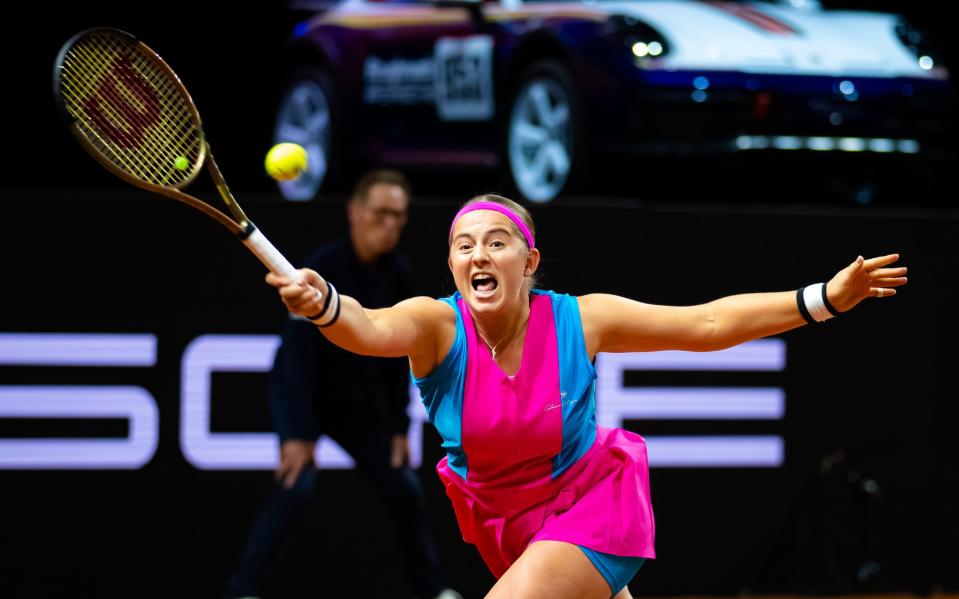 Jelena Ostapenko of Latvia in action against Emma Raducanu of Great Britain in the first round of the Porsche Tennis Grand Prix Stuttgart 2023 at Porsche Arena on April 18, 2023 - Getty Images/Robert Prange