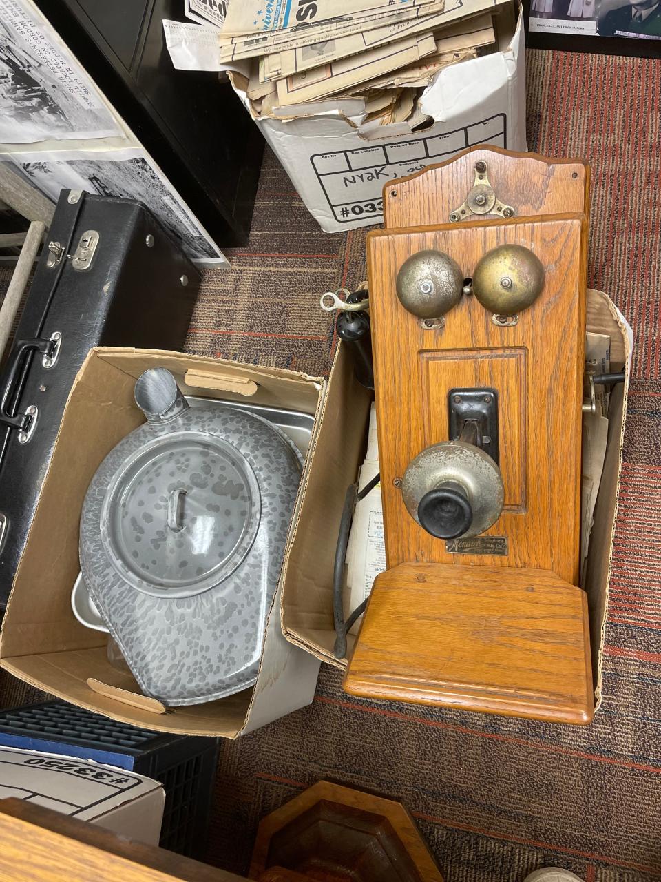 An old phone and chamber pot are among the donated items.