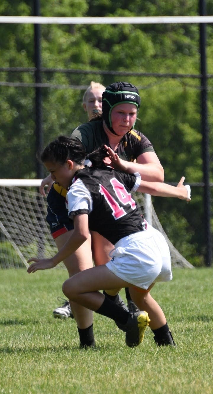 Reaghan King of Smyrna in action for the Doylestown Dragons rugby team.