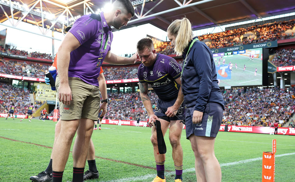 Cameron Munster, pictured here after suffering an injury in Melbourne's clash with Parramatta.