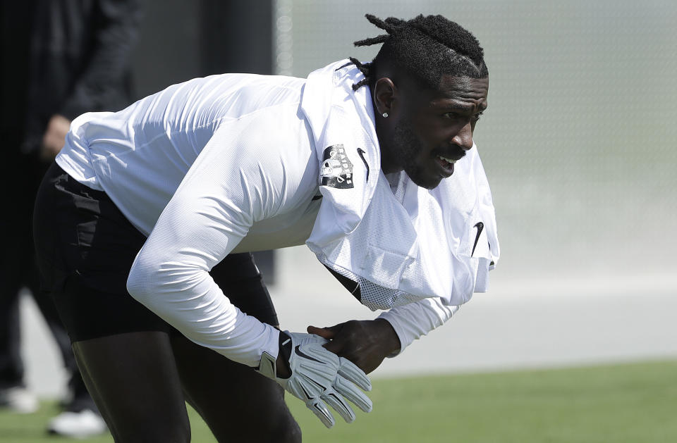 Oakland Raiders wide receiver Antonio Brown has been sitting out of practice due to his feet. (AP)