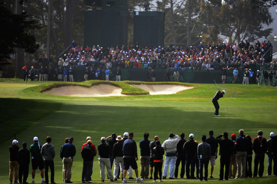 Tiger Woods of the United States hits a shot on the 16th hole during the first round of the 112th U.S. Open at The Olympic Club on June 14, 2012 in San Francisco, California. (Photo by Harry How/Getty Images)