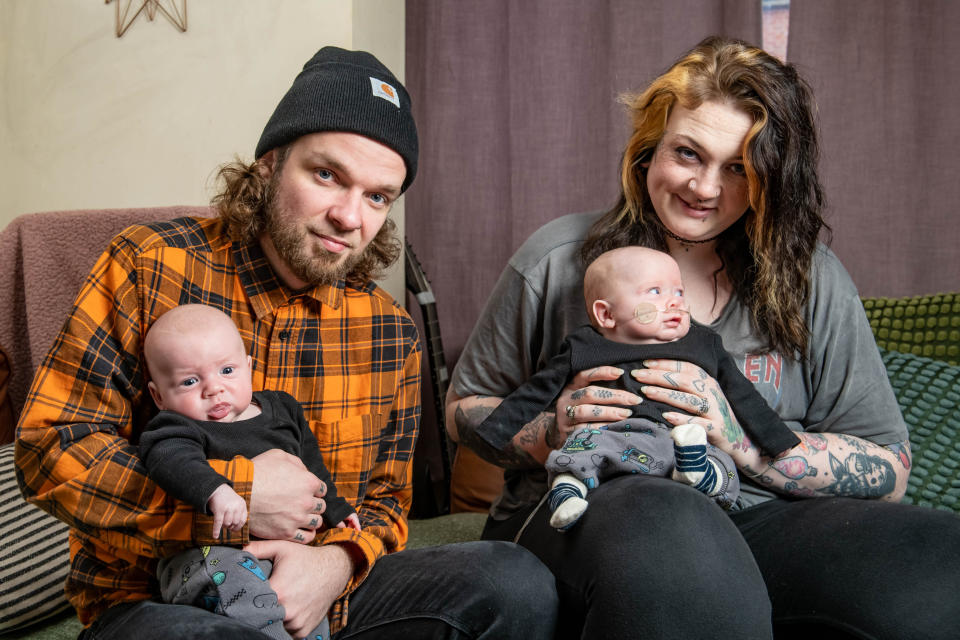 Corinne Rose and her partner Will Cattanach pictured with twins Grayson and Neo. (SWNS)