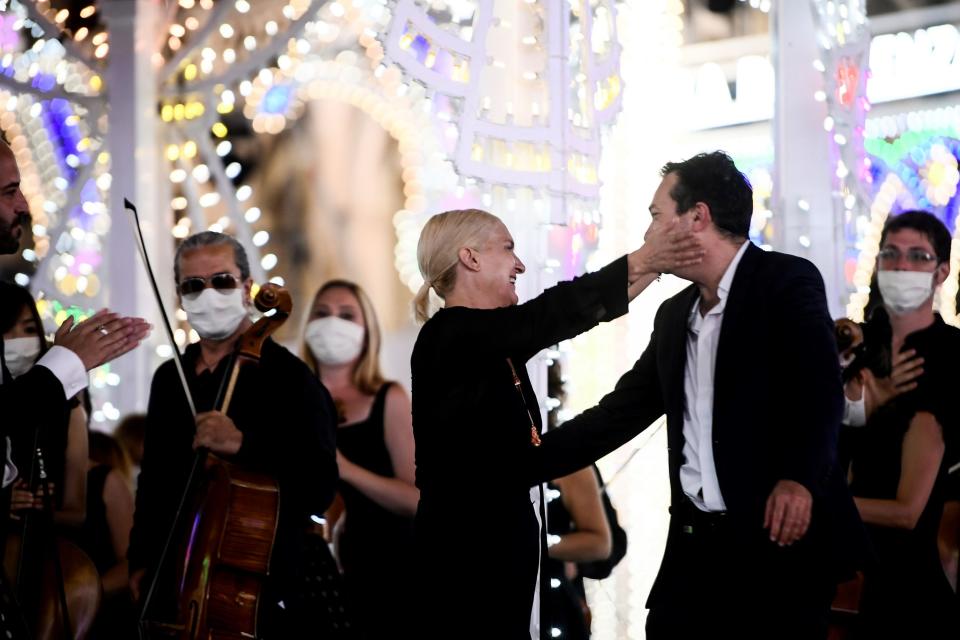 Grazia Chiuri at the end of the show with her team (AFP via Getty Images)