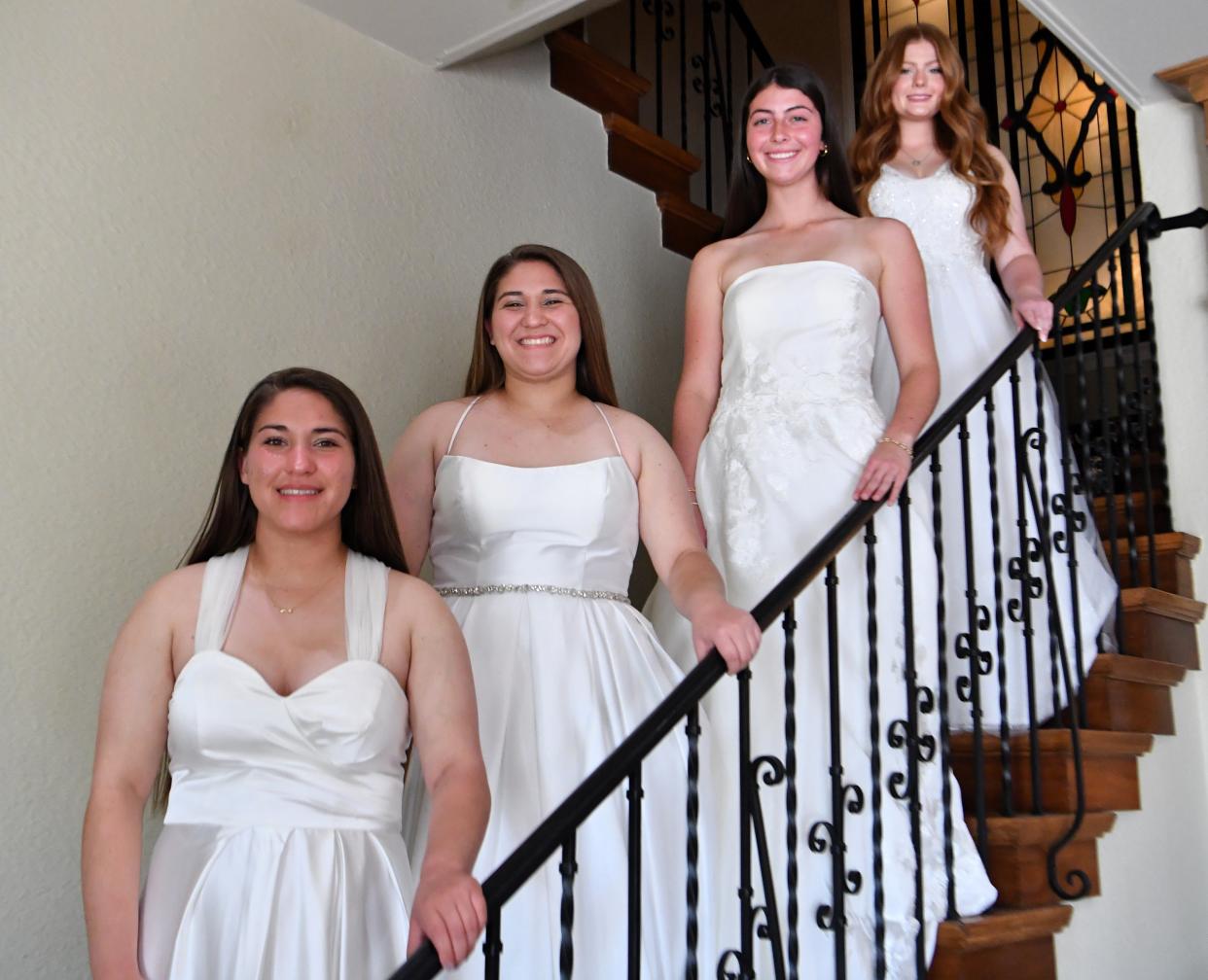 These Junior Forum debutantes shown here at The Forum are, top to bottom, Sophia Curry, Mia Gilmore, Aidan Herrera and Avery Herrera.