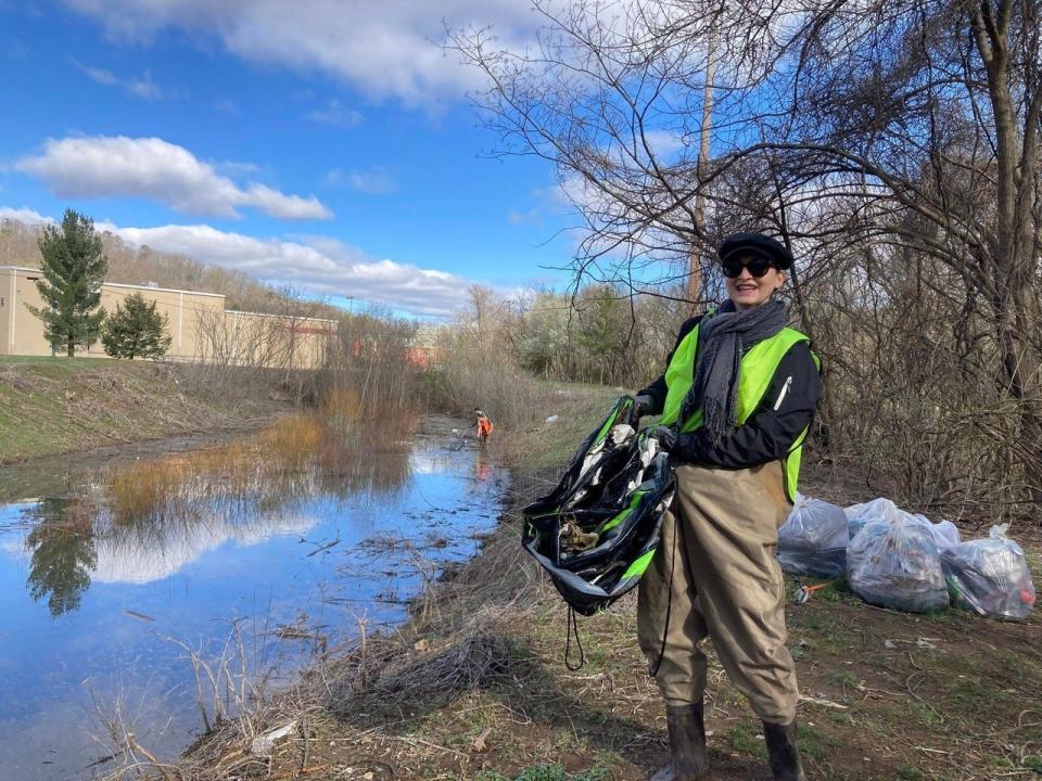 Volunteers remove trash and debris from outdoor spaces during a Keep Knoxville Beautiful event.