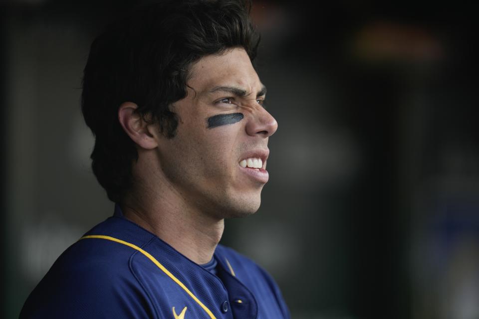 Milwaukee Brewers second baseman Luis Urias stands in the dugout during the seventh inning of a baseball game against the Chicago Cubs Thursday, March 30, 2023, in Chicago. (AP Photo/Erin Hooley)