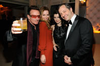 Bono, Eve Hewson, Leslie Mann, and Judd Apatow attend the 2013 Vanity Fair Oscar Party hosted by Graydon Carter at Sunset Tower on February 24, 2013 in West Hollywood, California.