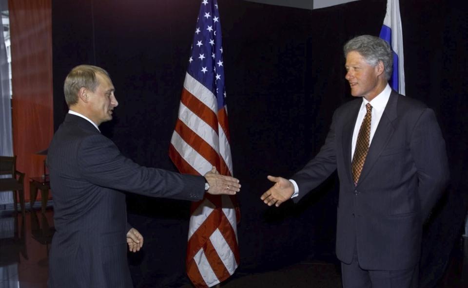 FILE - President Clinton greets Russia's new Prime Minister Vladimir Putin at the Stamford Plaza Hotel in Auckland, New Zealand on Sept. 12, 1999. Putin on Friday Dec. 8, 2023 moved to prolong his repressive and unyielding grip on Russia for another six years, announcing his candidacy in the 2024 presidential election that he is all but certain to win. (AP Photo/Greg Gibson, File)