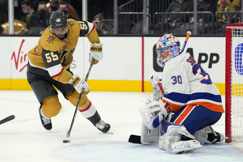 Vegas Golden Knights Keegan Kolesar tries to score on New York Islanders goaltender Ilya Sorokin (30) during the second period of an NHL hockey game, Sunday, Oct. 24, 2021, in Las Vegas. (AP Photo/Rick Scuteri)