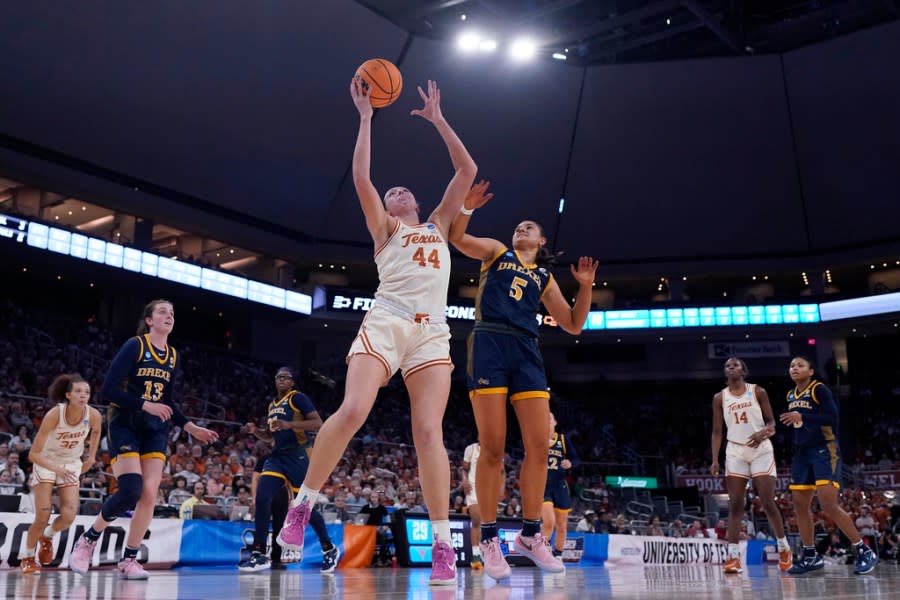 Texas forward Taylor Jones (44) shoots over Drexel forward Chloe Hodges (5) during the first half of a first-round college basketball game in the women’s NCAA Tournament in Austin, Texas, Friday, March 22, 2024. (AP Photo/Eric Gay)