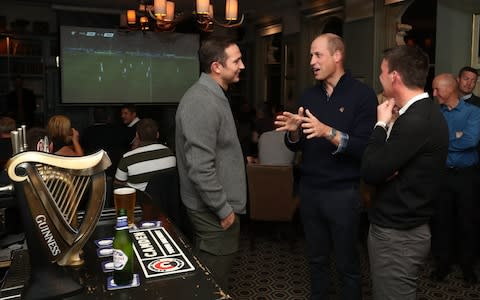 Duke of Cambridge chatting at the Heads Up Campaign - Credit: Chris Jackson/PA
