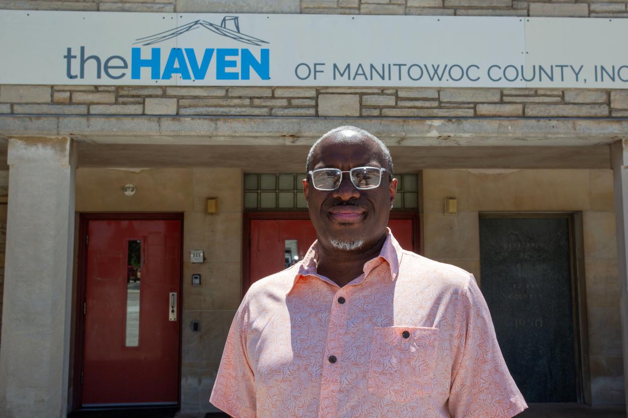 The Haven Executive Director Michael Etheridge poses at the entrance of the facility, Thursday, June 27, 2024, in Manitowoc, Wis.