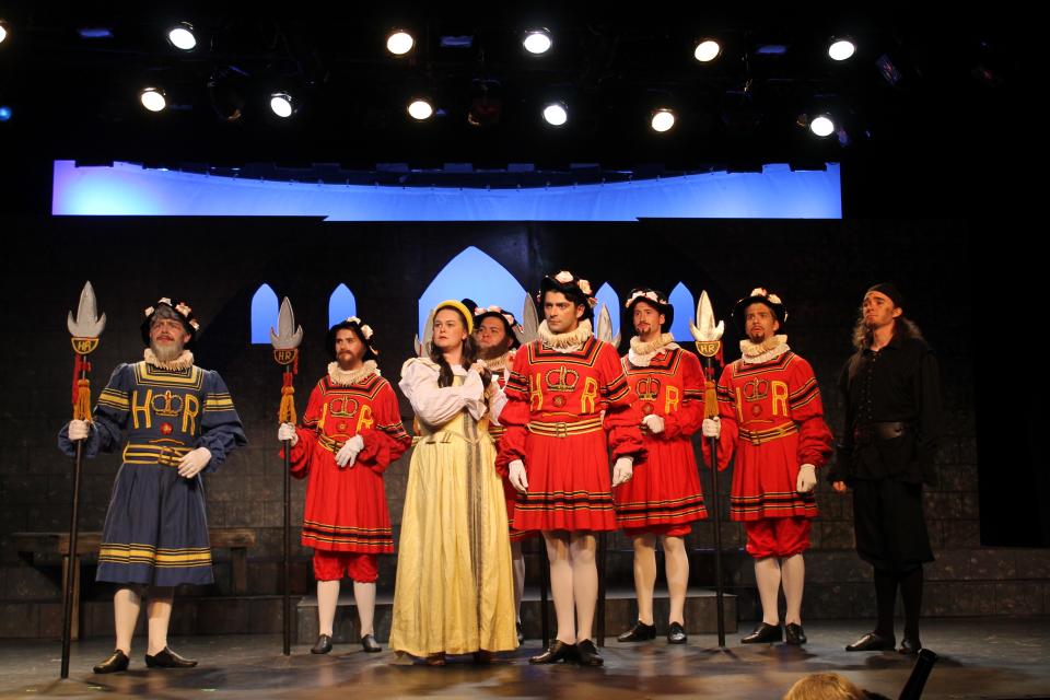 Christine Cummins as Phoebe, center, is surrounded in College Light Opera Company's "The Yeoman of the Guard."