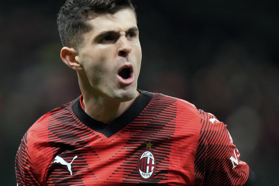 AC Milan's Christian Pulisic celebrates after scoring his side's second goal during the Serie A soccer match between AC Milan and Frosinone at the San Siro stadium, in Milan, Italy, Saturday, Dec. 2, 2023. (AP Photo/Luca Bruno)