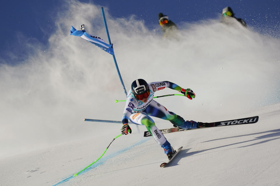 Slovenia's Ilka Stuhec crashes during an alpine ski an alpine ski, women's World Cup super-G in St. Moritz, Switzerland, Sunday, Dec. 12, 2021. (AP Photo/Marco Tacca)