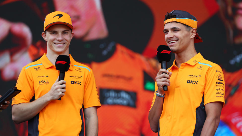 McLaren's Oscar Piastri (left) and Lando Norris (right) address fans prior to the first race of the season. 