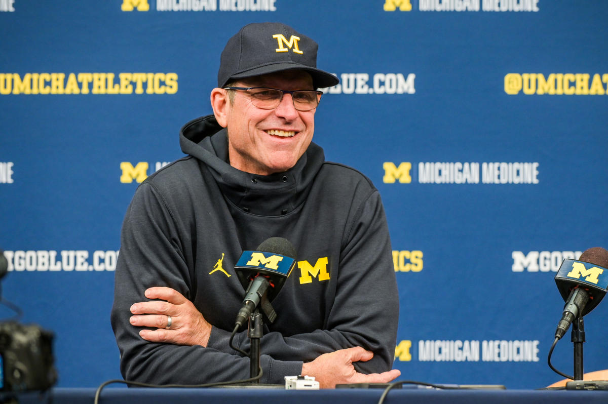 Jim Harbaugh calls Michigan president to say he's staying