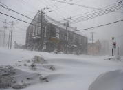 The streets were quiet St. John‚ Newfoundland on Friday, Jan. 17, 2020, as a major winter storm brought the city to a standstill. The city has declared a state of emergency, ordering businesses closed and vehicles off the roads as blizzard conditions descend on the Newfoundland and Labrador capital. (Andrew Vaughan/The Canadian Press via AP)