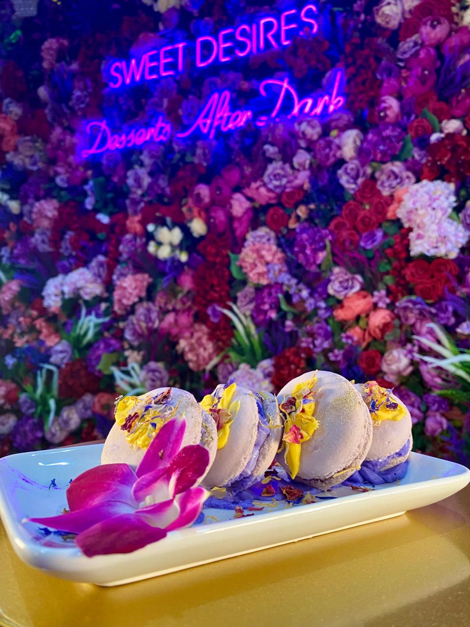 The new dessert lounge features its signature macarons on its menu.