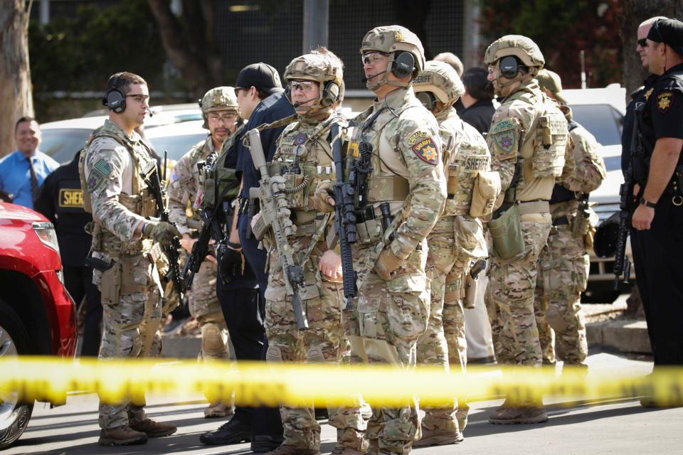 <p>San Mateo County SWAT team officers are seen near Youtube headquarters following an active shooter situation in San Bruno, Calif., April 3, 2018. (Photo: Elijah Nouvelage/Reuters) </p>