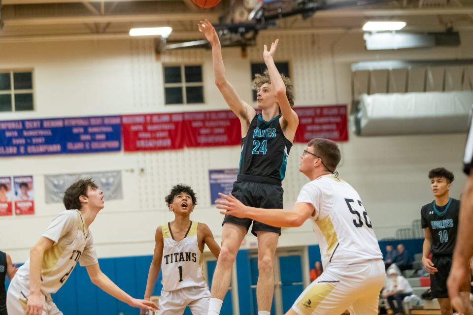 Arkport-Canaseraga junior center Kohler Preston lets a floater fly in the first half against Avoca-Prattsburgh Saturday night. A-P went on to a 60-43 victory. A-C will place in the consolation game Wednesday evening in Campbell at 5:45 p.m. against Hammondsport.