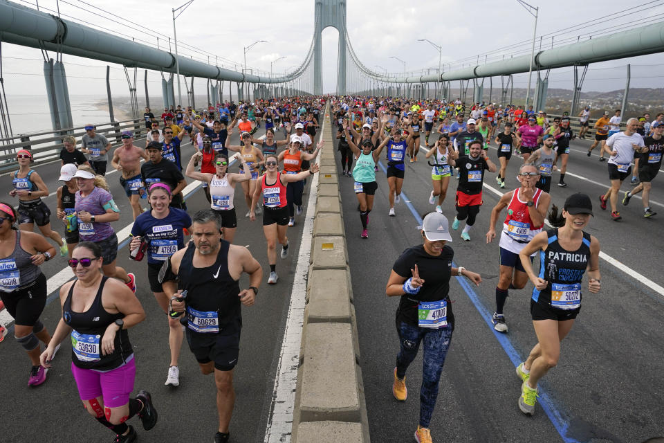 FILE - Runners cross the Verrazzano-Narrows Bridge at the start of the New York City Marathon in New York, Sunday, Nov. 6, 2022. The New York City Marathon organizers will soon have to pay a toll to cross a state bridge, just like every other commuter, if transit officials in New York have their way. The Metropolitan Transportation Authority is demanding the New York Road Runners, organizers of the venerable race held the first Sunday each November, to pay roughly $750,000 for use of the Verrazzano-Narrows Bridge. (AP Photo/Seth Wenig, File)