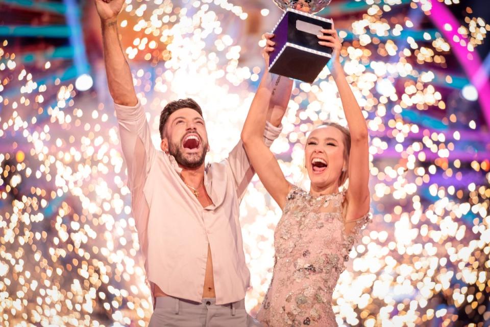 Rose Ayling-Ellis and Giovanni Pernice with the glitterball trophy during the final of Strictly Come Dancing 2021 (Guy Levy/PA) (PA Media)