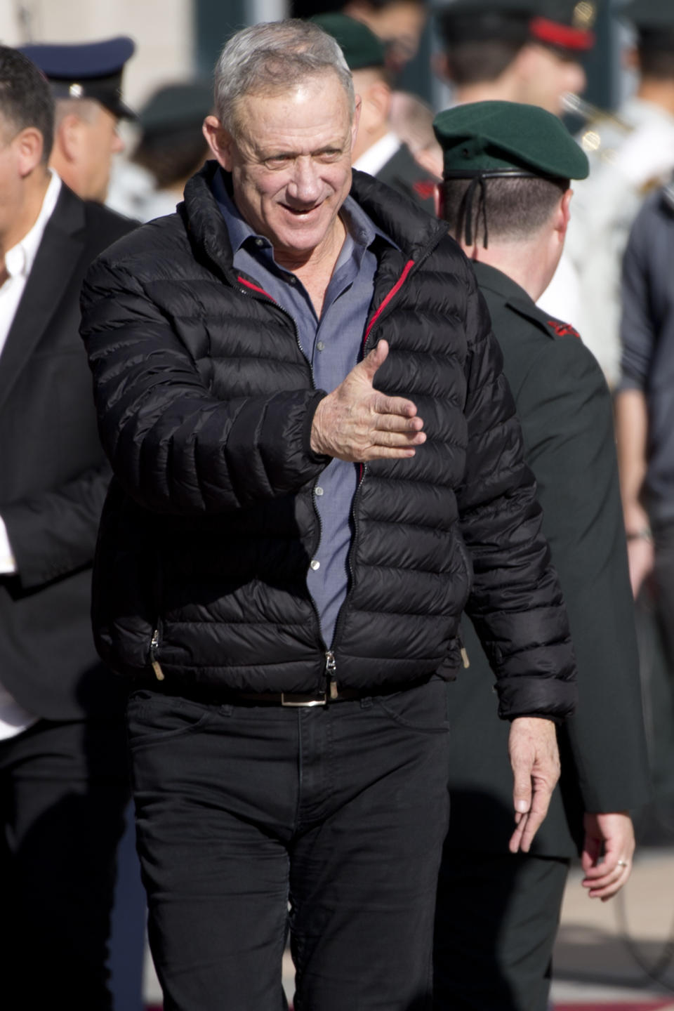 Retired Israeli military chief Lt. Gen. Benny Gantz attends the ceremony for New Israeli Chief of Staff Lt. Gen. Aviv Kochavi in Tel Aviv, Israel, Tuesday, Jan. 15, 2019. Retired Lt. Gen. Benny Gantz has been polling favorably in recent weeks, emerging as a fresh, exciting face in Israel's staid political landscape. By officially registering his new party, "Israel Resilience," Gantz shakes up a snap three-month election campaign that has been widely seen as Netanyahu's to lose. (AP Photo/Ariel Schalit)