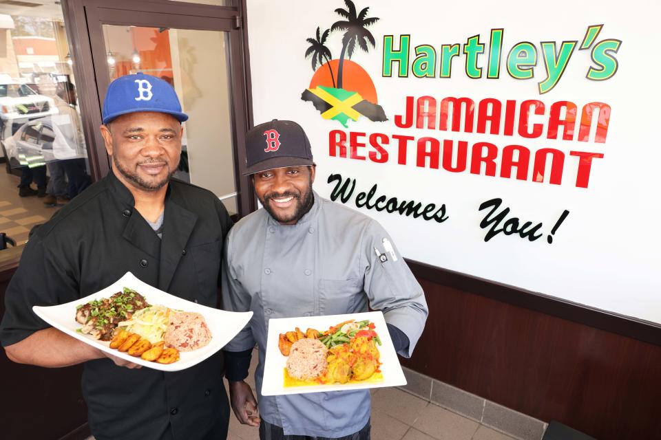 Hartley's Jamaican Restaurant co-owner Hartley Thompson, left, and Ryan Junior Clarke, on Friday, March 31, 2023.  